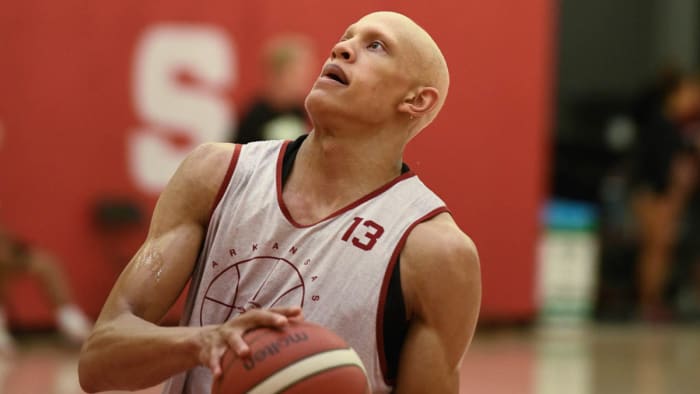 Razorbacks freshman Jordan Walsh drives for a lay-up during drills Wednesday, July 27, 2022, in the third practice of the summer in Fayetteville in preparation for trip to Europe for four exhibition games.